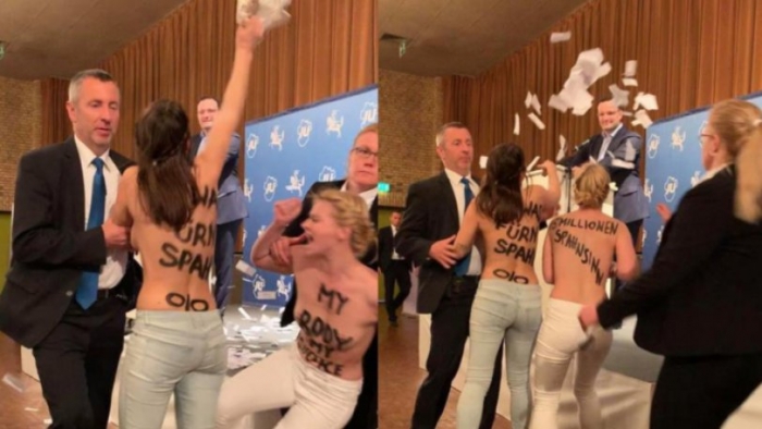 NDËRPRITET FJALIMI I MINISTRIT GJERMAN, AKTIVISTET NUDO PROTESTOJNË PËR ABORTIN (VIDEO)