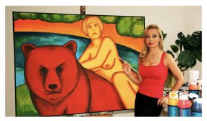 Artistja ruse pikturon nudo kancelaren gjermane Merkel, mbi një ari të kuq