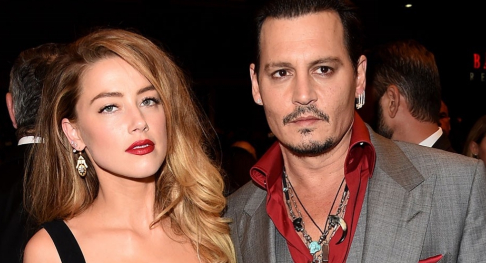 Pas divorcit me Johnny Depp, Amber Heard kapet mat duke u puthur me një femër